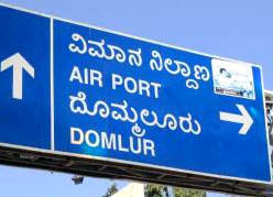 Picture of a bilingual road sign in Karnataka